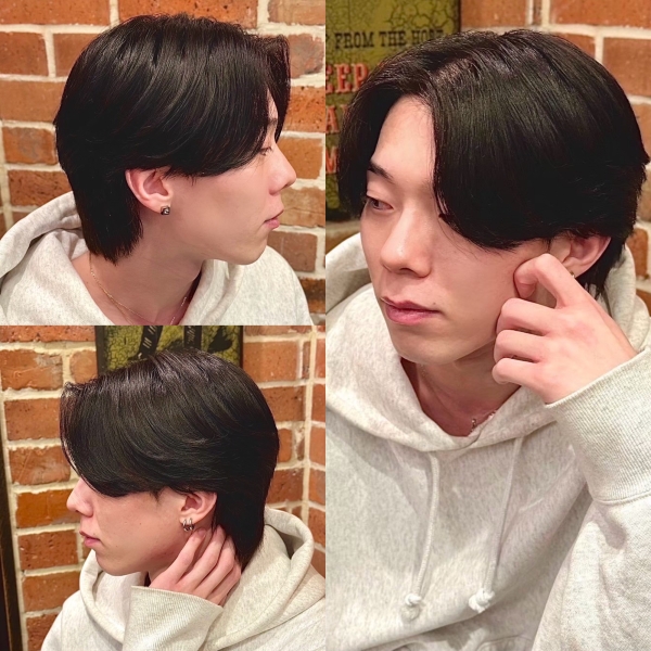 ナチュラルに決まる黒髪センターパート。抜け感と品のバランスが絶妙。