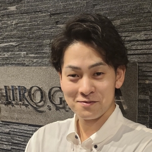 根塚 学